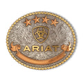The Ariat Oval Beaded Edge Buckle (A37055) features gold trim, four gold stars, a central shield emblem, floral scrollwork, and "ARIAT" in gold letters. Finished in aged silver and aged gold by Ariat.