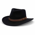 The Avenel Hats Mens Buck Australian Wool Felt Outback Hat (21894) in black features a wide brim, brown leather band, and metal accent, displayed on a white background.