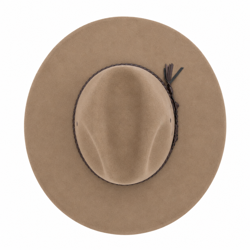 A top view of a donkey coloured cowboy style Avenel The Overflow Western Hat (22100) with a braided brown band on a white background.