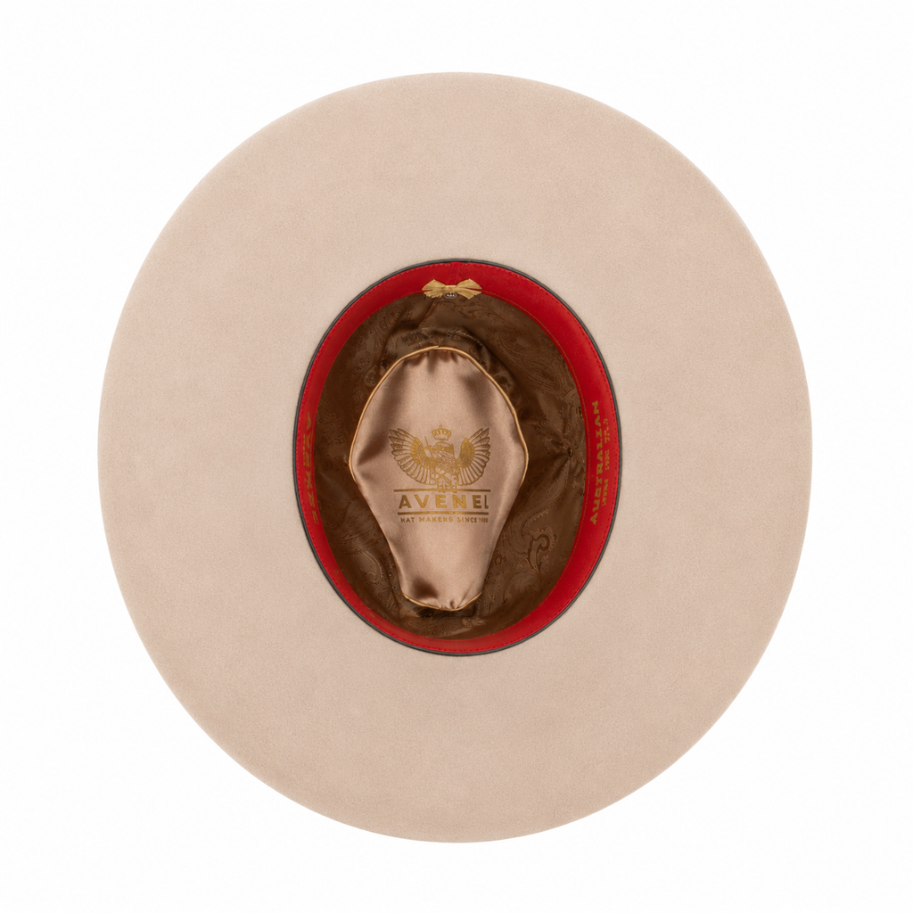 An inner view of a grain coloured cowboy style Avenel Hats The Overflow Western Hat (22100) with a brown plaited band on a white background.