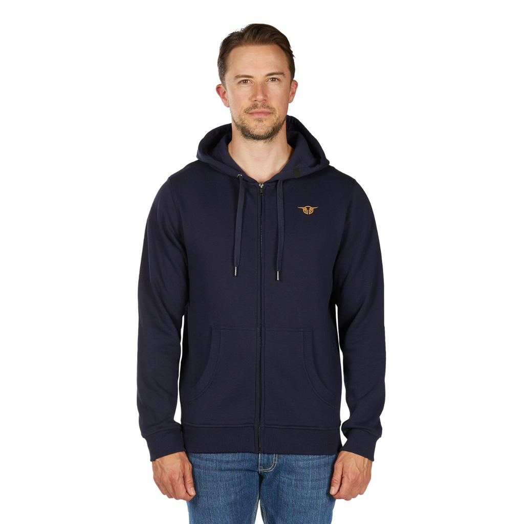 A man wearing the Bullzye Mens Hardy Zip Up Hoodie (B6W1710501) in navy and blue jeans stands facing forward against a plain white background.