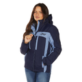A woman with long dark hair wears the Bullzye Womens Carla Jacket (B6W2709529) in Light Blue/Navy by Bullzye, paired with blue jeans, standing against a white background.