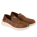 The Ringers Western Unisex Cruiza Slip On Shoes (125088RW) in Rusty Brown feature white soles, visible stitching, and a branded patch—comfortable and stylish slip-ons from Ringers Western for everyday wear.