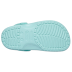 The bottom sole of an aquamarine Crocs Children's Classic Clog (206991-4PD) on a white background., showing the textured tread pattern and embossed Croc logo, on a solid white background.