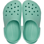 A pair of retro mint Crocs Children's Classic Clogs (206991-5DV) with circular ventilation holes, shown from a top-down view on a plain white background.
