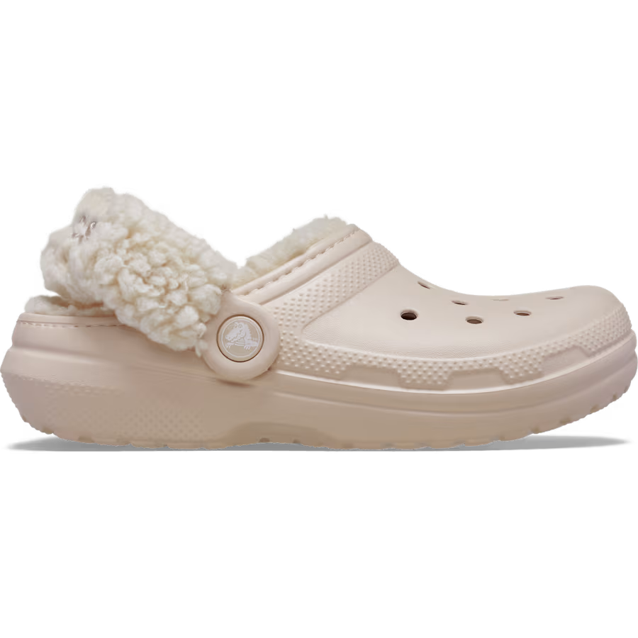 A quartz coloured Crocs Children's Classic Fleece Lined Clog (212856-6UR) featuring a plush cream sherpa lining and strap with a circular logo button, shown in a side profile on a white background.