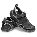 A pair of black and grey Crocs Men's Swiftwater Mesh Deck Sandals (205289-001), displayed on a clean white background.
