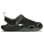 A black and grey Crocs Men's Swiftwater Mesh Deck Sandal (205289-001) in side view, displayed on a clean white background.