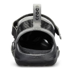A black and grey Crocs Men's Swiftwater Mesh Deck Sandal (205289-001) heel view, displayed on a clean white background.