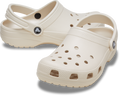 The Crocs Childrens Classic Clogs (206991-2MC) Frappe by Crocs feature ventilation holes and a heel strap in a beige color—ideal water-friendly clogs to add to your kids' daily shoe collection.