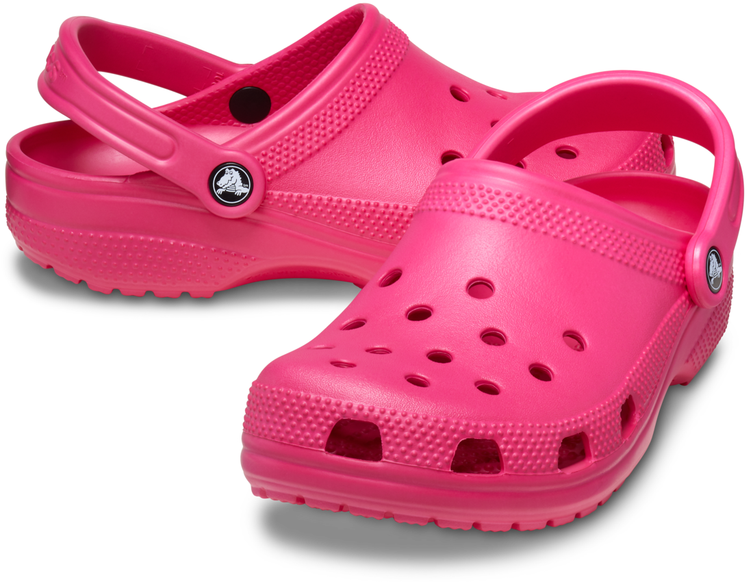 Crocs Unisex Classic Clogs (10001-6ZQ) in Dragonfruit: bright pink, water-friendly shoes with ventilation holes, textured soles, and adjustable heel straps—comfortable and ideal for everyday wear. Brand: Crocs.