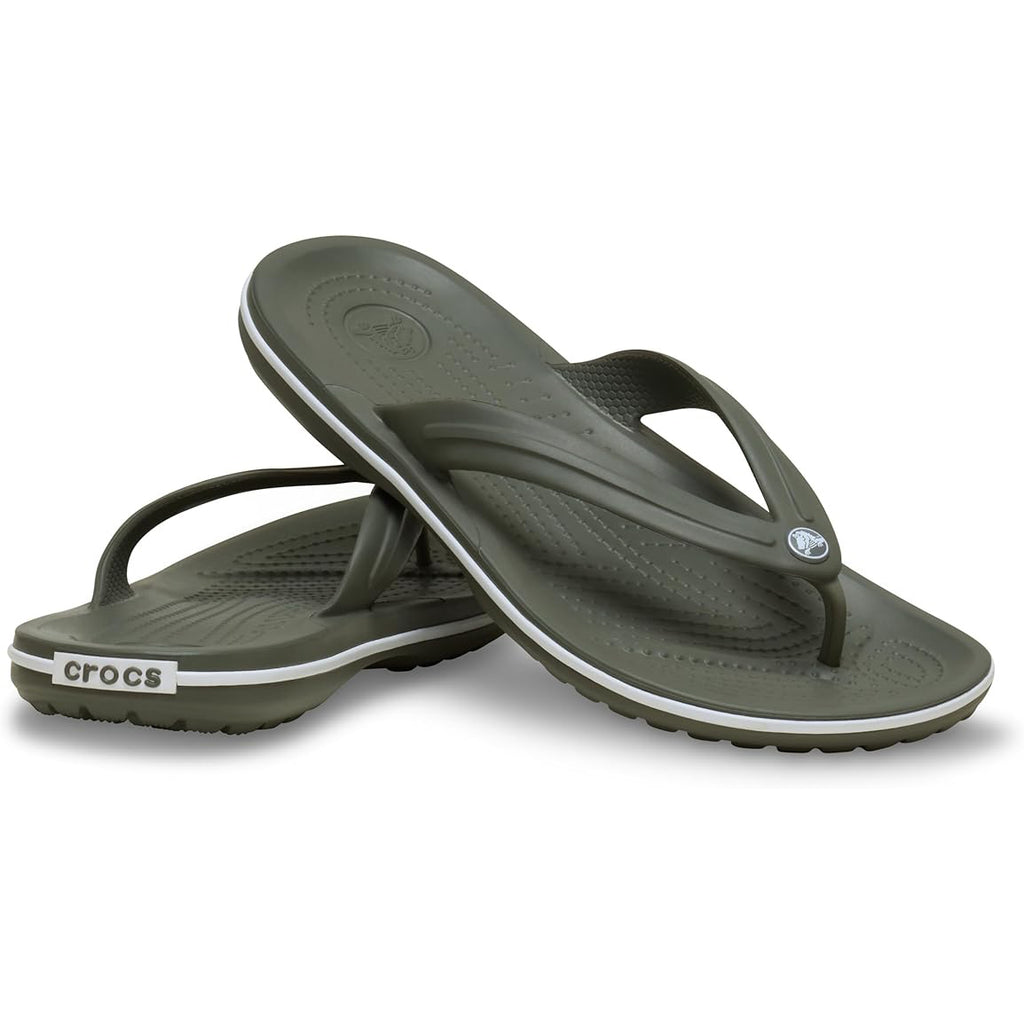 A pair of Crocs Unisex Crocband Flip Flops (11033-3J5) in Dusty Olive, featuring lightweight construction, textured footbeds, and a white stripe on the sole, shown overlapping on a white background. Water-friendly for all-day comfort.