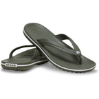 A pair of Crocs Unisex Crocband Flip Flops (11033-3J5) in Dusty Olive, featuring lightweight construction, textured footbeds, and a white stripe on the sole, shown overlapping on a white background. Water-friendly for all-day comfort.