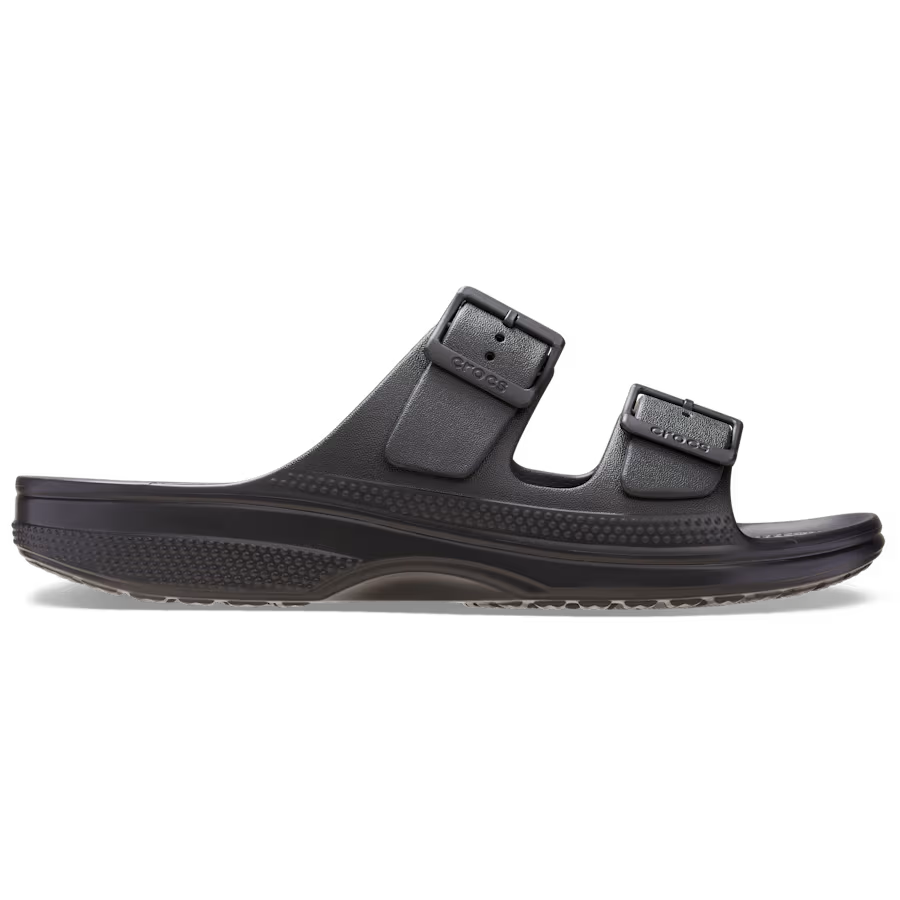 The Crocs Men's Saturday Sandals (212245-001) Black feature two adjustable straps and Crocs Comfort with a textured sole, shown side view on a white background.