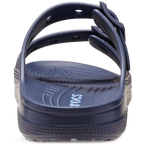 Heel view of a Navy Crocs Men's Saturday Sandal (212245-410) with 'Crocs' branding on a transparent background.