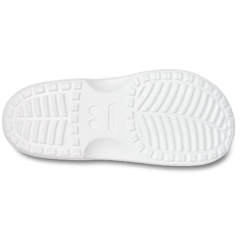 White Crocs Women's Saturday Sandal (213586-100) sole with textured pattern on a transparent background.
