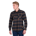 A man in blue jeans and light hair wears the Dux-Bak Mens Hunter L/S Thermal Shirt (D6W1116205) in Navy/Dark Tan, a long-sleeve, button-up check shirt with front pockets, as he stands looking to his left.