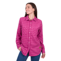 A woman smiles to her left, wearing a Dux-Bak Womens Jazz L/S Thermal Shirt in Hot Pink (D6W2150111) and blue jeans. Her right hand is in her pocket, left arm by her side, against a plain white background.
