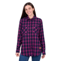 A woman with long brown hair, wearing the Dux-Bak Womens Sybel L/S Thermal Shirt in Pink/Navy and blue jeans, stands smiling against a white background.