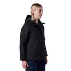 A woman modelling a black hooded FXD Women's WO-1W Insulated Waterproof Jacket (FX12407001), shown in profile against a plain white background.