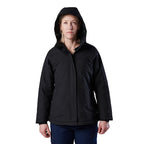 A woman modelling a black hooded FXD Women's WO-1W Insulated Waterproof Jacket (FX12407001) and navy pants, standing against a plain white background.