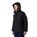 A woman modelling a black hooded FXD Women's WO-1W Insulated Waterproof Jacket (FX12407001) with green zipper accents and a small green logo near the hem, shown in profile against a plain white background.