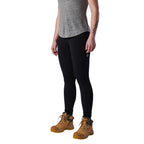 A 3-4 view of a woman modelling a black pair of FXD Women's Work Leggings (WP-9W) paired with a grey tee and wheat coloured work boots against a white background.