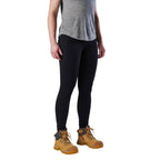 A 3-4 view of a woman modelling a black pair of FXD Women's Work Leggings (WP-9W) paired with a grey tee and wheat coloured work boots against a white background.
