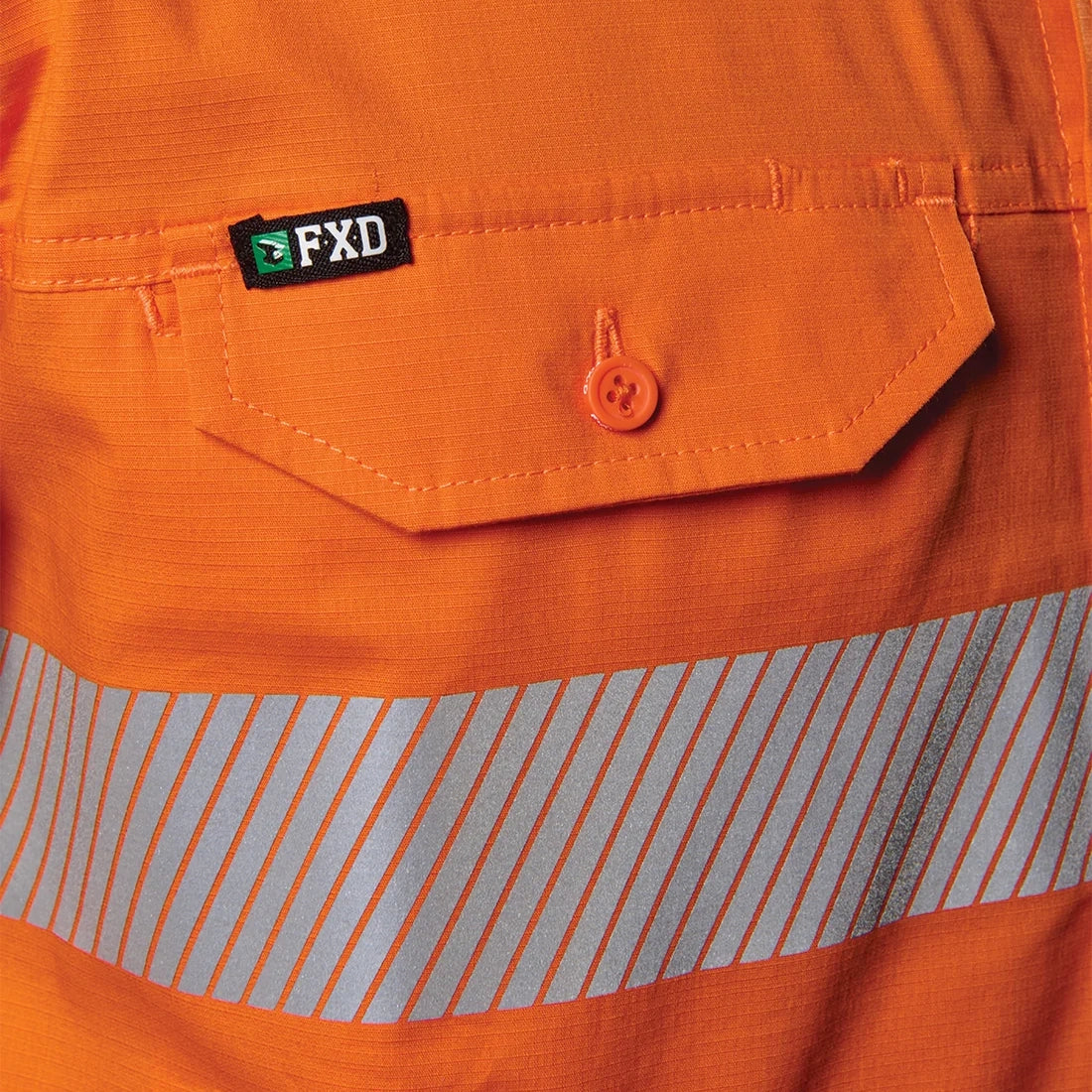 Close up detail of an orange and navy FXD Men's LSH-4T Vented Tech Hi-Vis Long Sleeve Work Shirt (FX02504010).