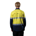 A back view of a man wearing a yellow and navy FXD Men's LSH-4T Vented Tech Hi-Vis Long Sleeve Work Shirt (FX02504010) with hi vis tape and a pair of black work pants on a white background.