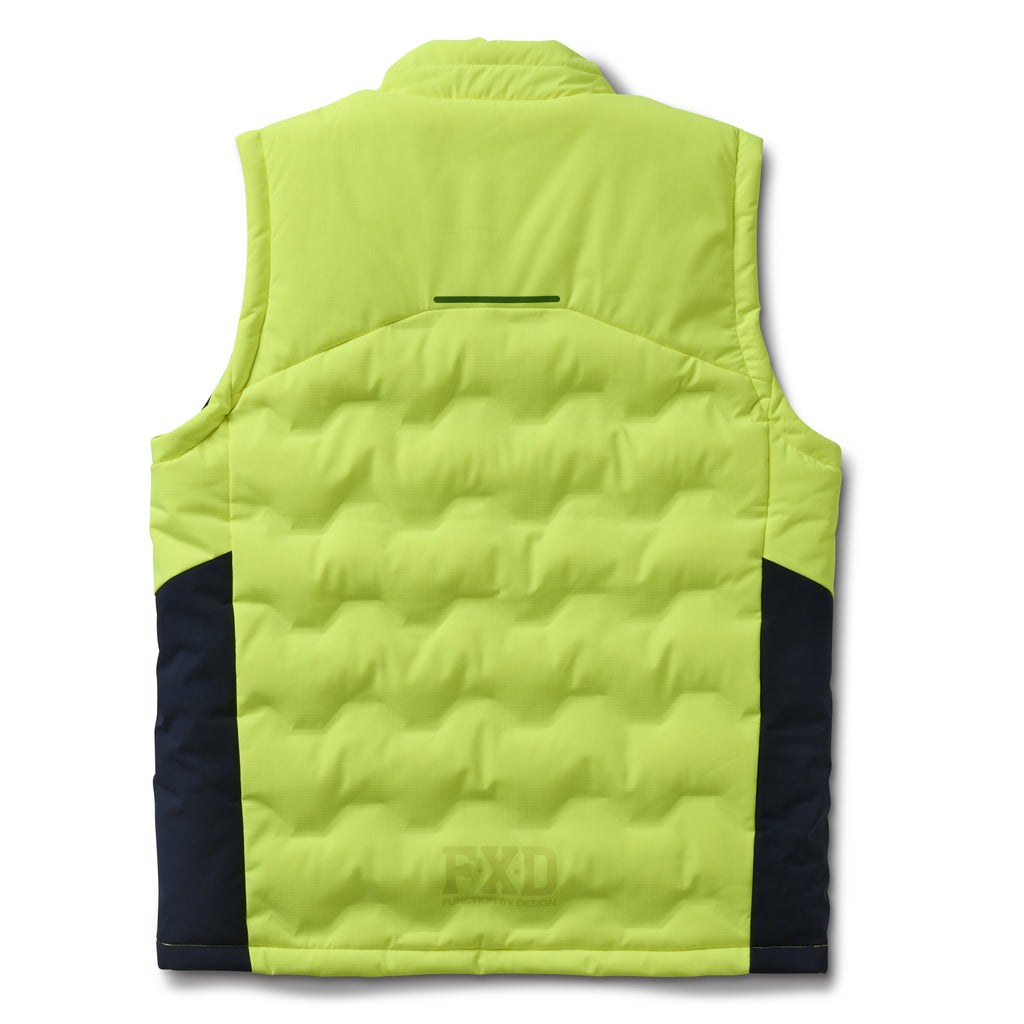 The FXD Mens WO-6 Puffer Vest (FX02407005) in yellow is a sleeveless, water-repellent insulated vest with black side panels, black zipper, high collar, padded warmth, and FXD branding on the chest and lower left hem.