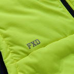 The FXD Mens WO-6 Puffer Vest (FX02407005) in yellow is a sleeveless, water-repellent insulated vest with black side panels, black zipper, high collar, padded warmth, and FXD branding on the chest and lower left hem.