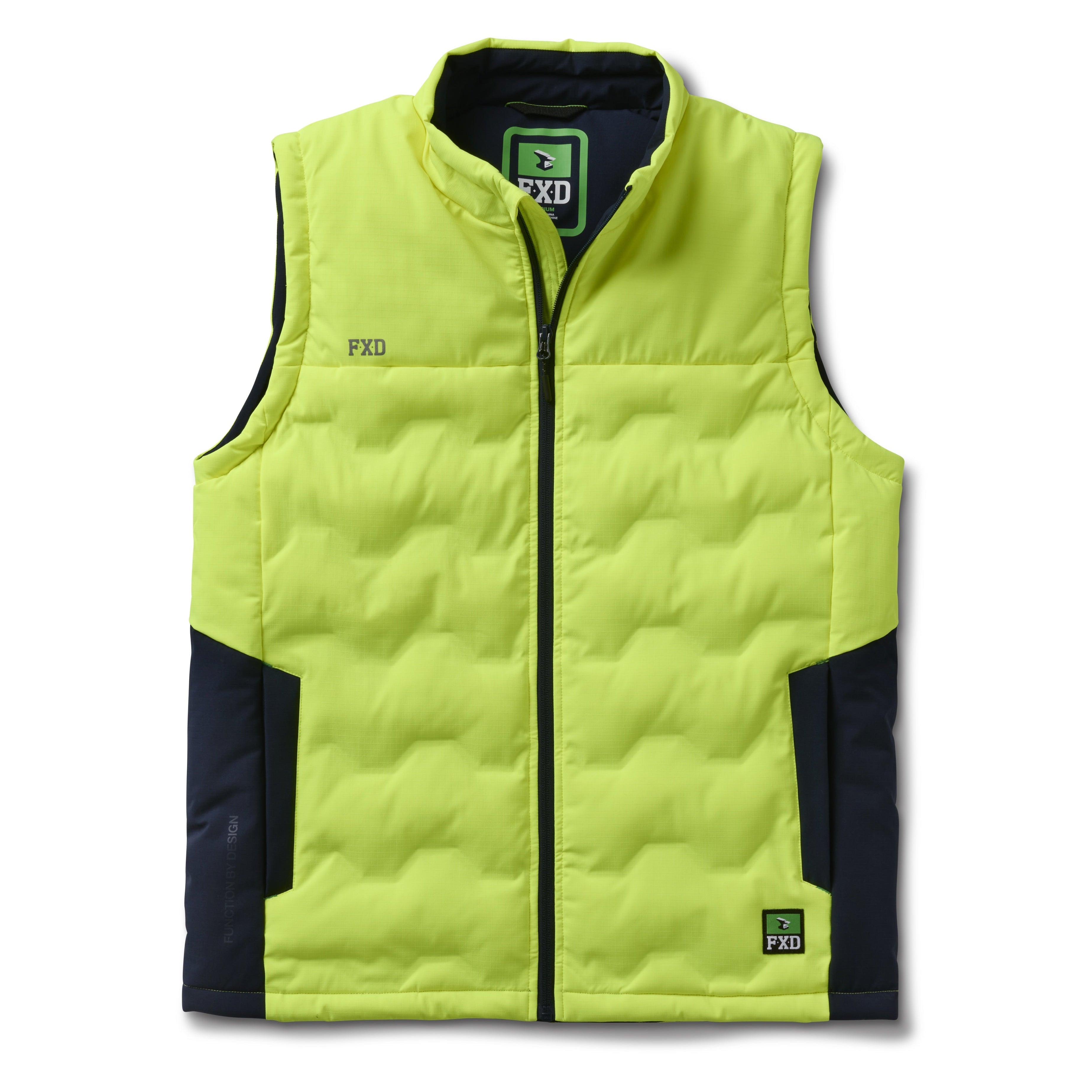 The FXD Mens WO-6 Puffer Vest (FX02407005) in yellow is a sleeveless, water-repellent insulated vest with black side panels, black zipper, high collar, padded warmth, and FXD branding on the chest and lower left hem.