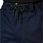 A close up showing the waist cord detail on a pair of navy FXD Men's WP-12CT Elastic Waist Stretch Ripstop Cuffed Taped Work Pants (FX02606029) on a white background.
