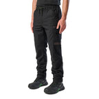 A 3-4 front view of a man wearing black cargo style FXD Men's WP-12 Elastic Waist Stretch Ripstop Work Pants (FX02506026) with black work boots on a white background.
