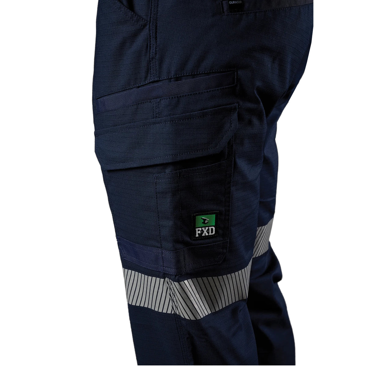 Close up left side pocket detail of a pair of navy blue FXD Men's WP-12T Elastic Waist Stretch Ripstop Taped Work Pants (FX02606028) on a white background.