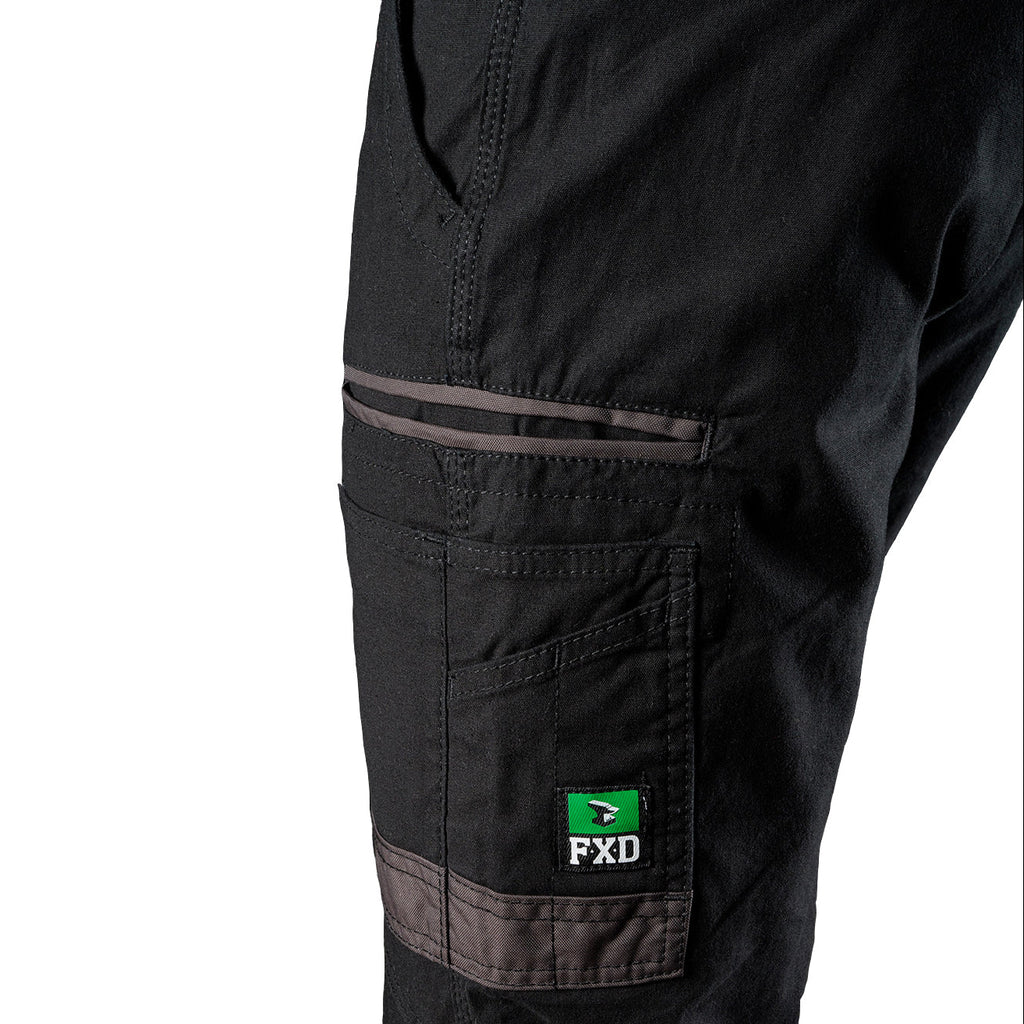 Close up pocket detail on a pair of black FXD Men's WP-4 Stretch Cuffed Work Pants (FX01616003) with cargo pockets, shown against a plain white background.