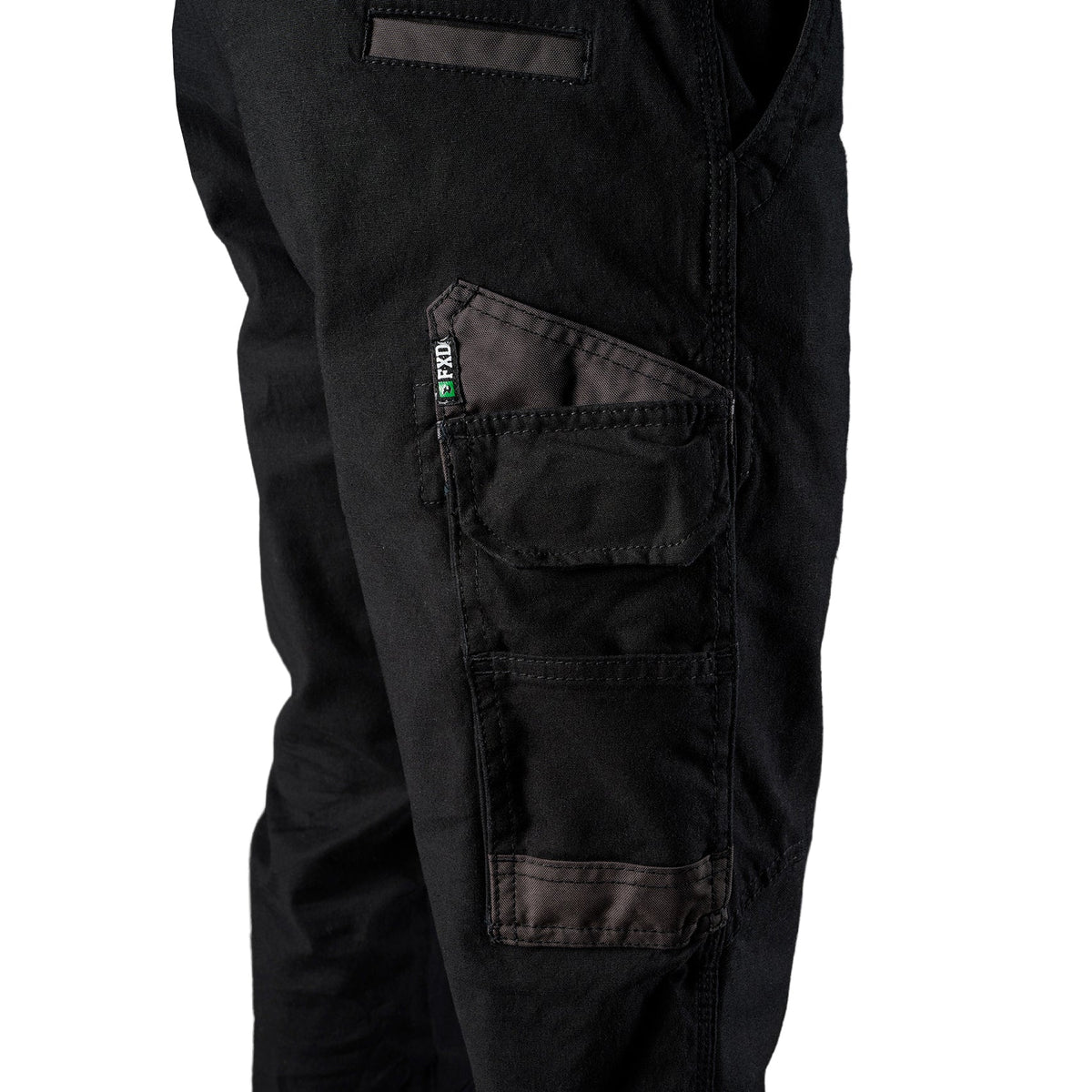 Close up pocket detail on a pair of black FXD Men's WP-4 Stretch Cuffed Work Pants (FX01616003) with cargo pockets, shown against a plain white background.