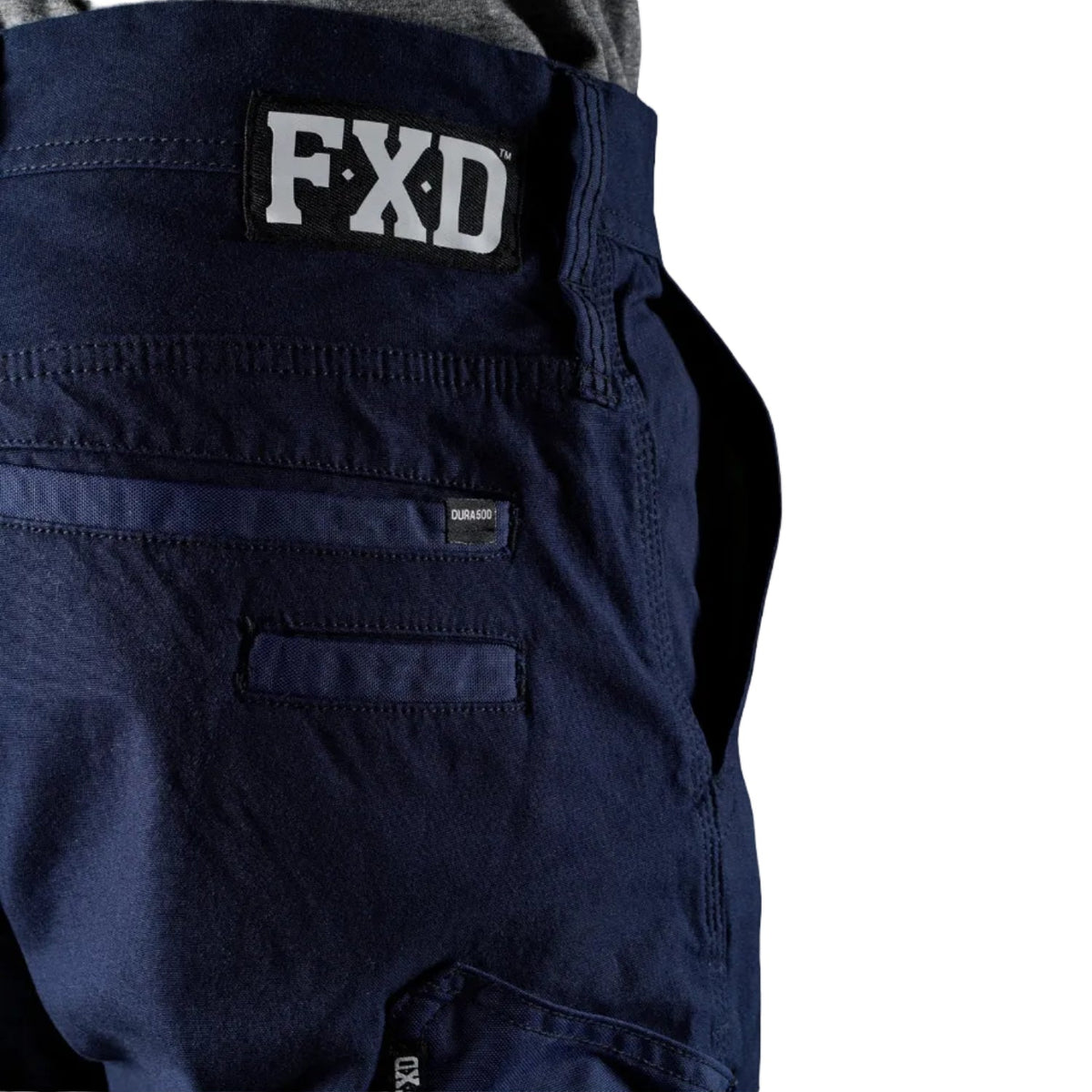 Close up waist and pocket detail of a pair of navy FXD Men's WP-4 Stretch Cuffed Work Pants (FX01616003) against a plain white background.