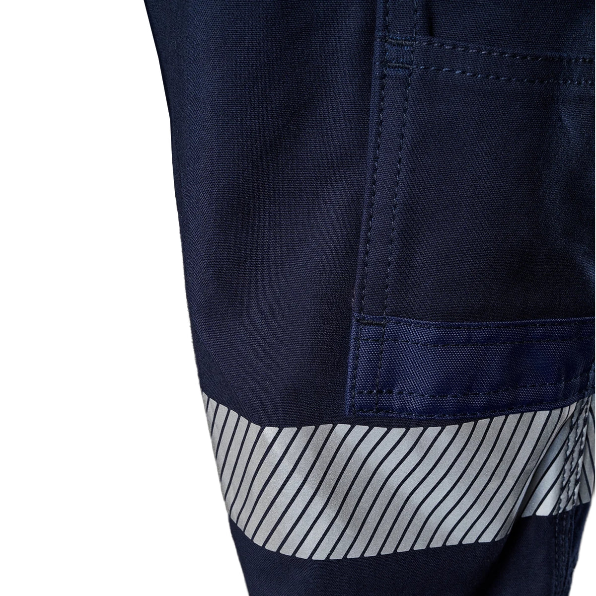 A close up view of the pocket and reflective strip detail on a pair of navy blue FXD Men's WP-4T Reflective Cuffed Work Pants (FX02106017) with reflective silver bands on the legs against a plain white background.