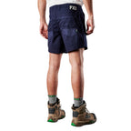 A man viewed from behind, modelling navy blue FXD Men's WS-2 Work Shorts (FX01136005), paired with grey socks, and stone FXD work boots, shown from the waist down on a plain white background.