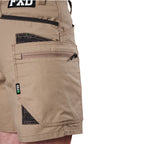 A close-up of khaki FXD Men's WS-6 Work Shorts (FX02306021, showing  pocket detailing, with a white background on the right.