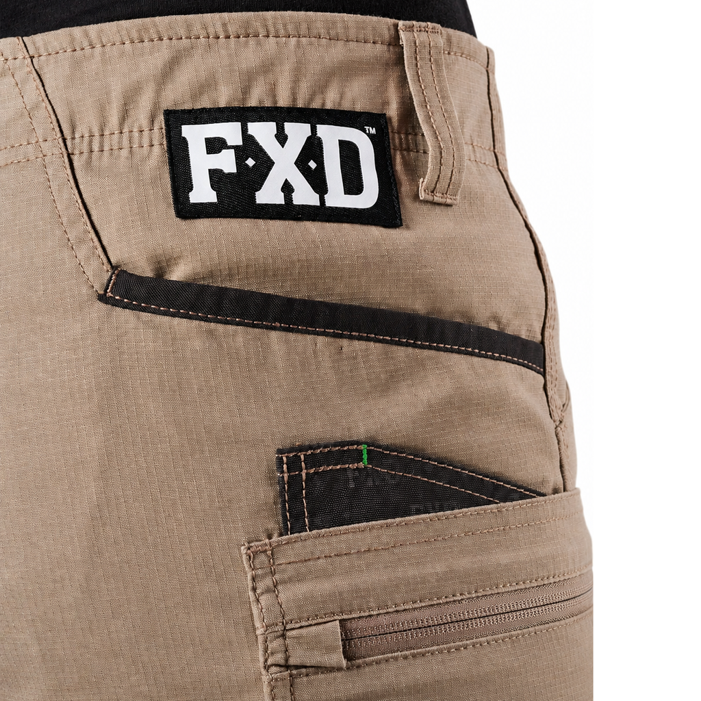 A close-up of khaki FXD Men's WS-6 Work Shorts (FX02306021, showing  pocket detailing, with a white background on the right.