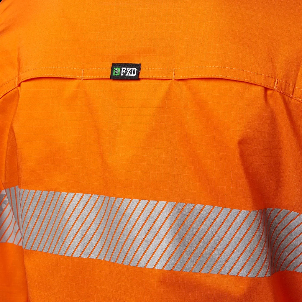 Close up detail of the back vents, FXD pip label and tape on an orange FXD Women's LSH-2WT Hi Vis Taped Long Sleeve Work Shirt (FX12404100) on a white background.