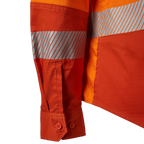 Close up detail of the sleeve cuff and tape on an orange FXD Women's LSH-2WT Hi Vis Taped Long Sleeve Work Shirt (FX12404100) on a white background.