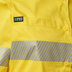 Close up detail of tape and the chest pocket on a yellow FXD Women's LSH-2WT Hi Vis Taped Long Sleeve Work Shirt (FX12404100) on a white background.