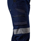 A close up view of the right side of the navy blue FXD Women's Taped Cargo Work Pants (WP-7WT) with reflective silver bands on the legs against a plain white background.