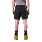 A model from the waist down wearing black FXD Men's WS-6 Work Shorts (FX02306021), black crew socks, and tan work boots against a plain white background.