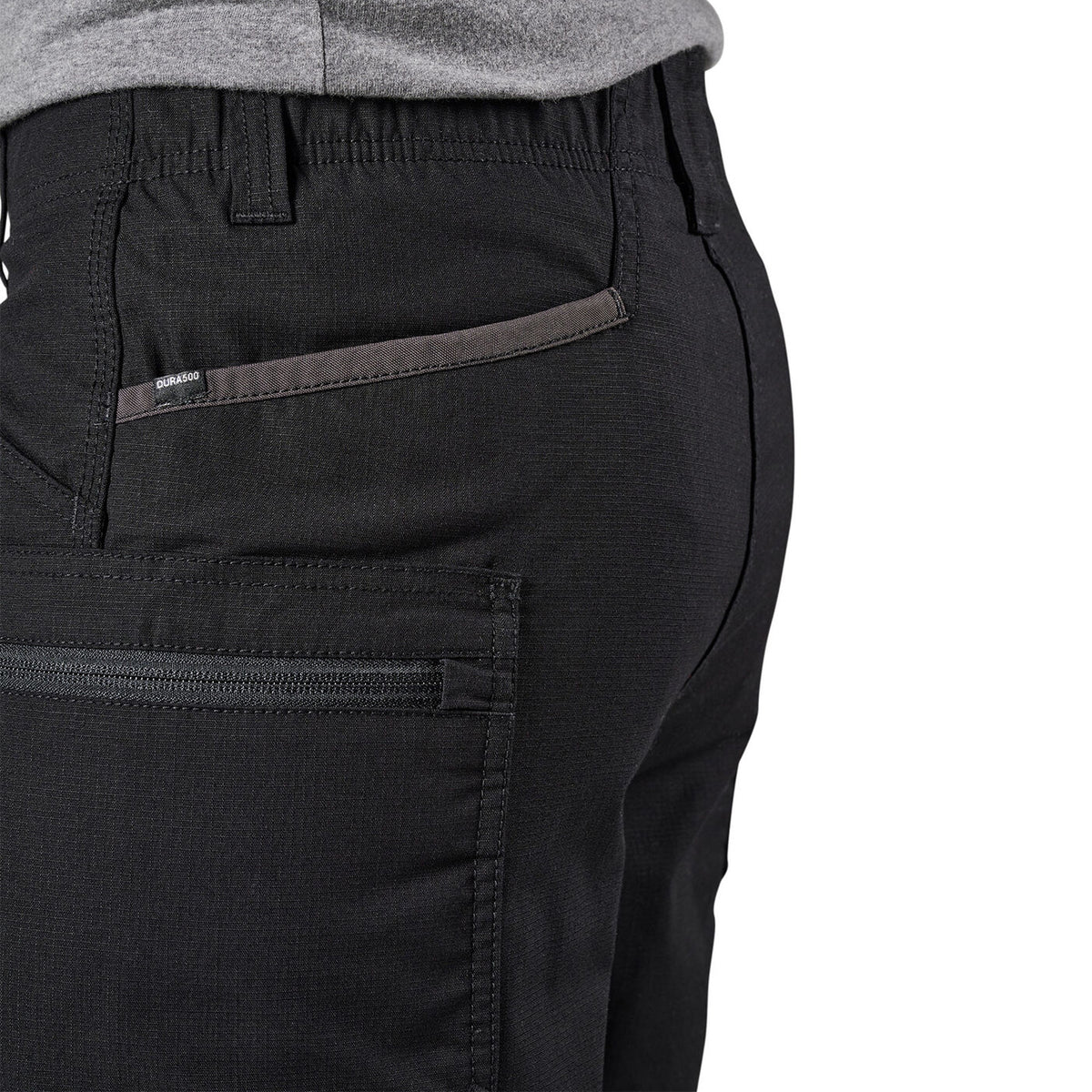 Close-up of the back waist and side pocket area of black FXD Men's WS-6 Work Shorts (FX02306021, showing  pocket detailing, with a white background on the right.