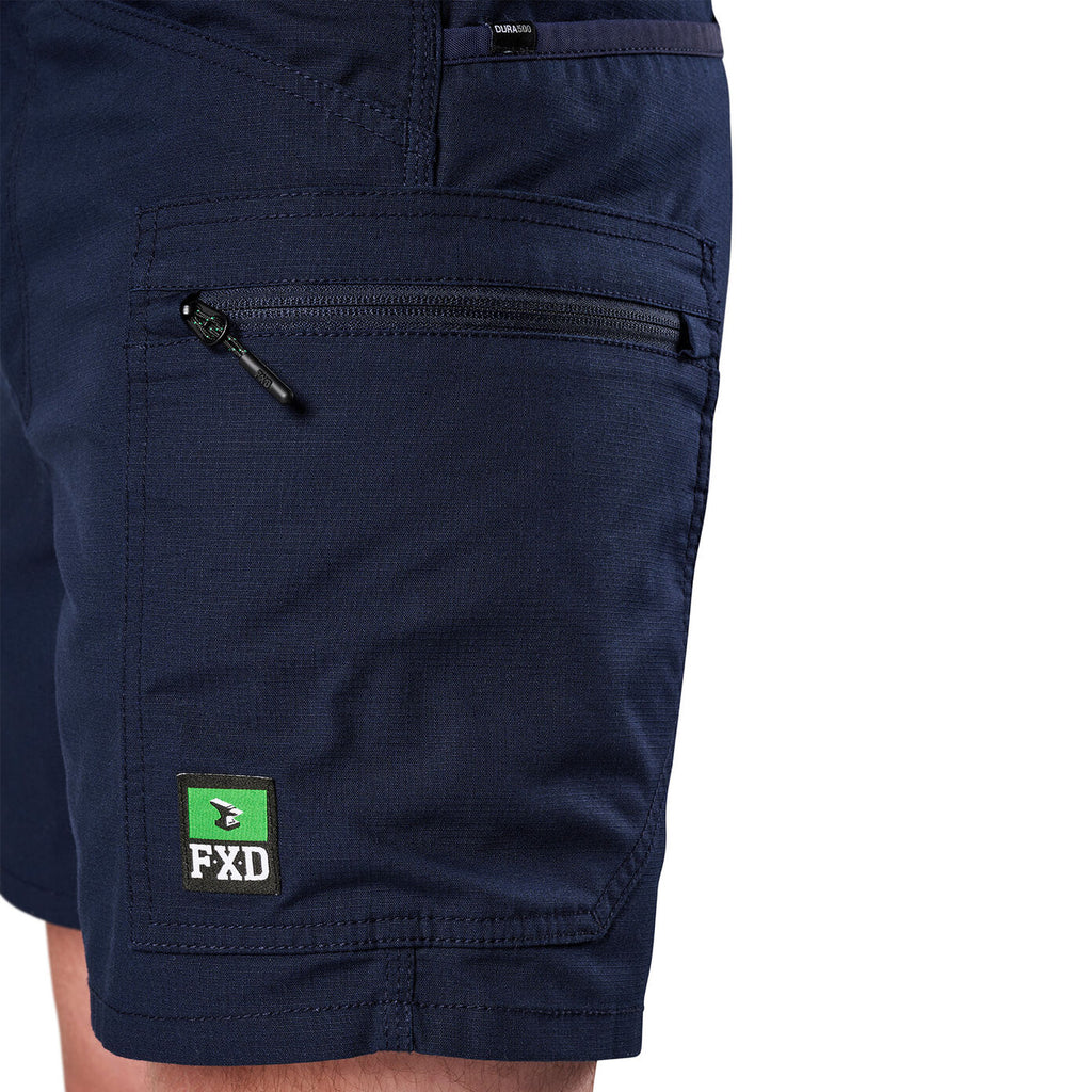 Close-up of navy FXD Men's WS-6 Work Shorts (FX02306021, showing  pocket detailing, with a white background on the right.